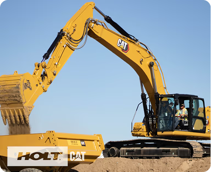 HOLT CAT excavator on job site